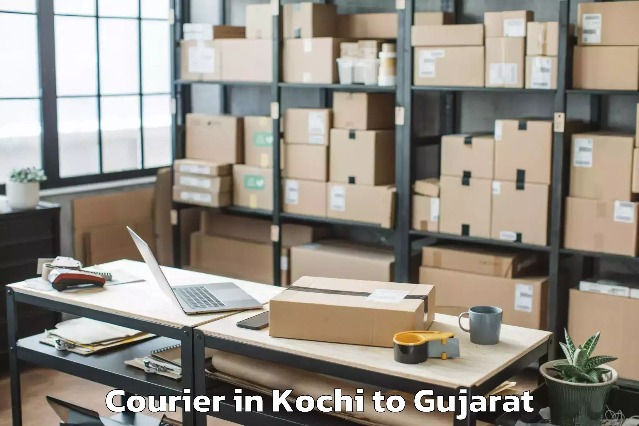 Book Your Kochi to Kamdhenu University Gandhinaga Courier Today